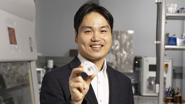 Individual holding the new pacifier