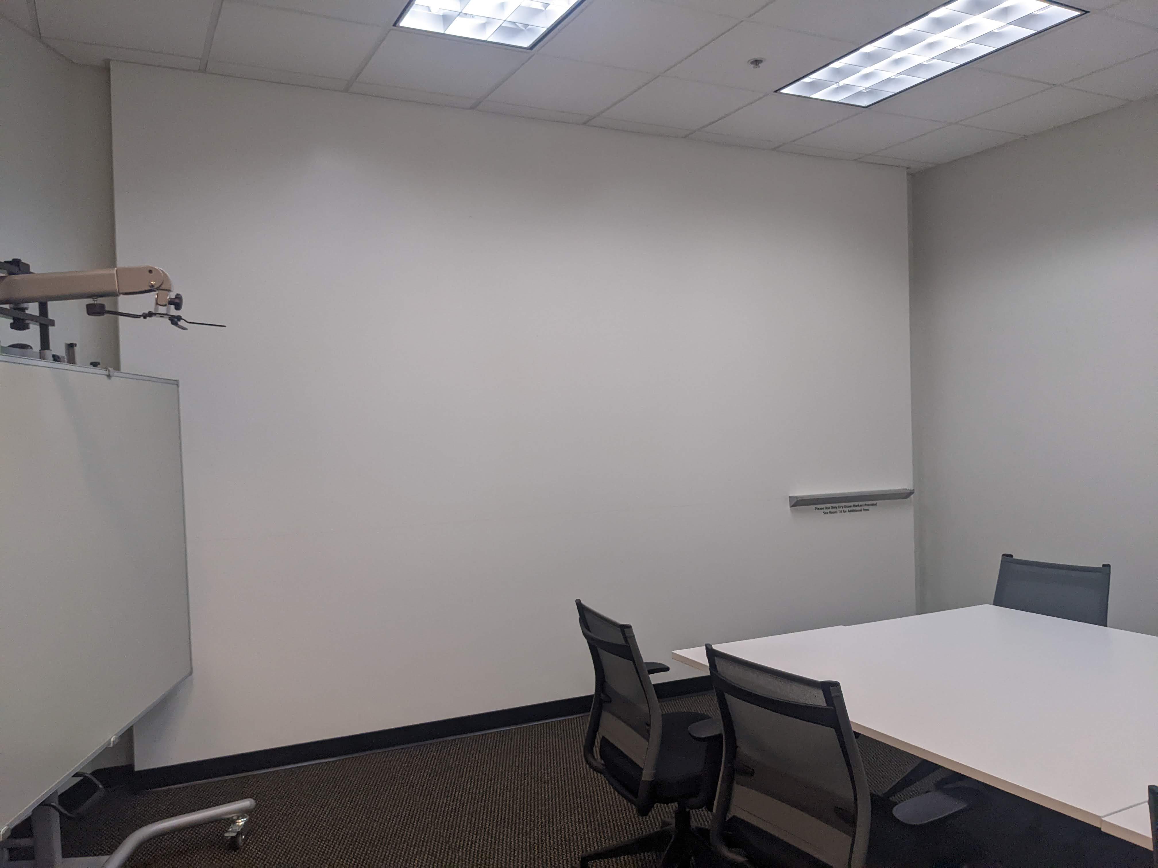 Conference table and whiteboard