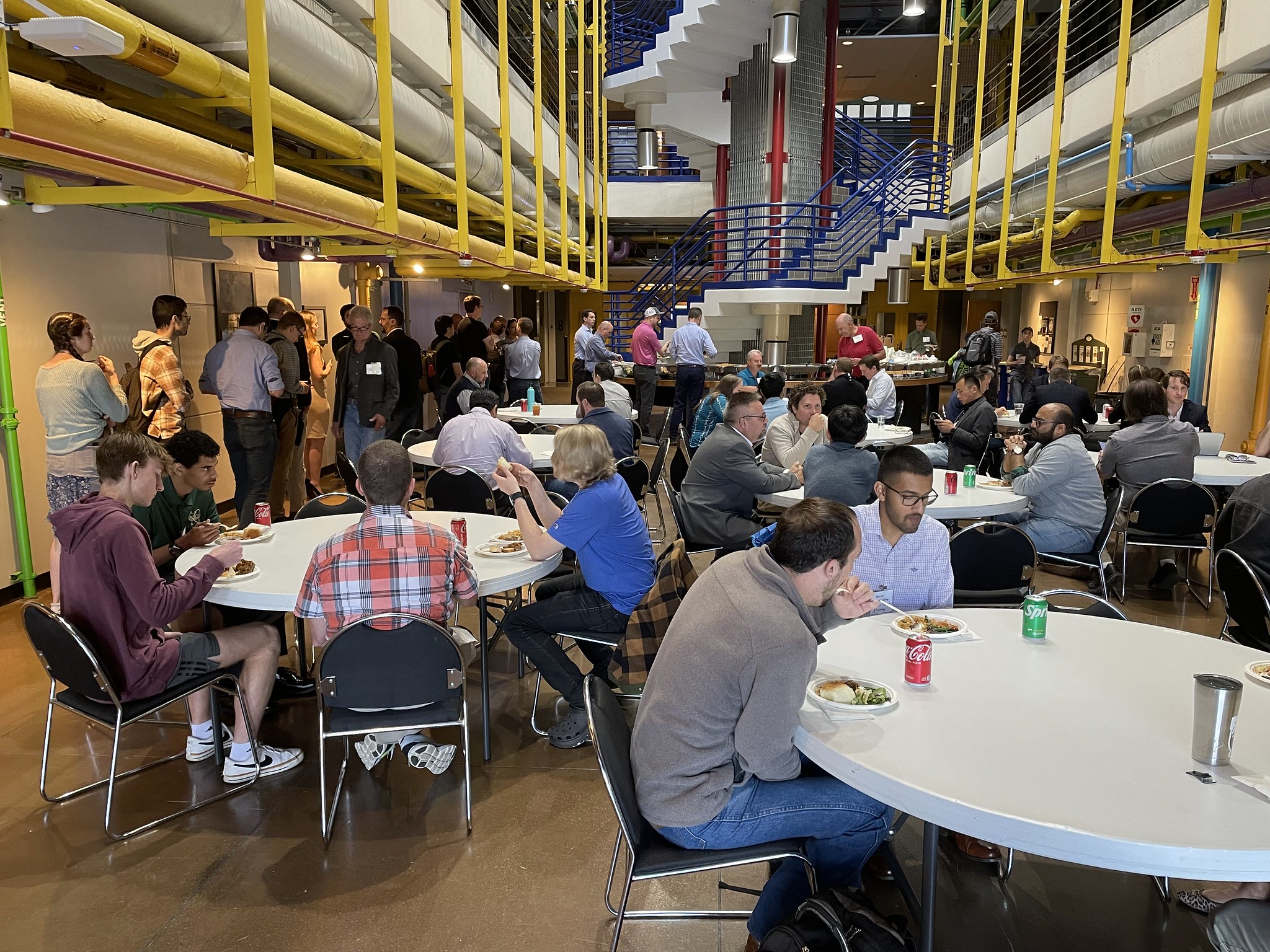 Group of students at an event in the GTMI building lobby