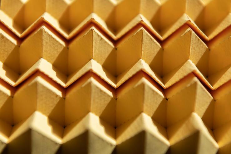 <p>A new type of origami can morph from one pattern into a different one, or even a hybrid of two patterns, instantly altering many of its structural characteristics. (Credit: Allison Carter)</p>