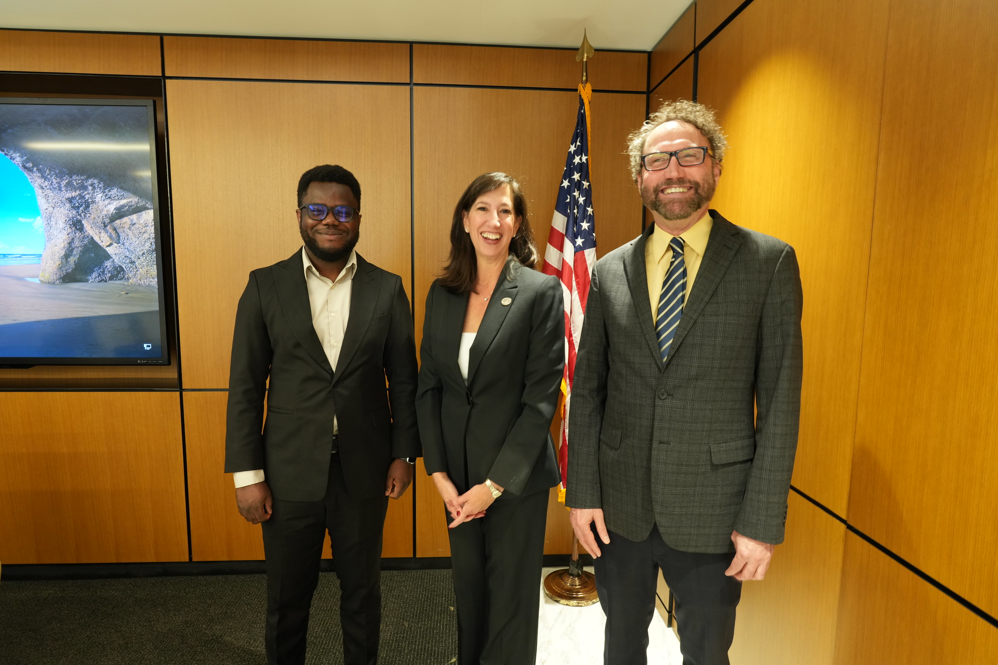 Pictured left-to-right: Daniel Nkemelu, Paige Alexander, and Michael Best, executive director of IPAT