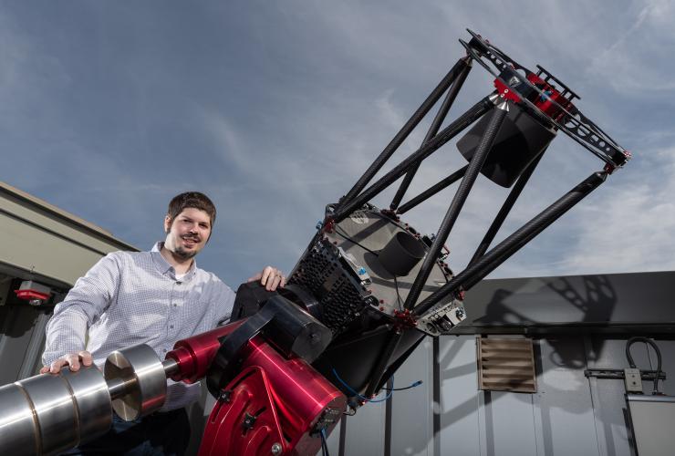 Astrophysicist Billy Quarles at the telescope atop Georgia Tech's observatory