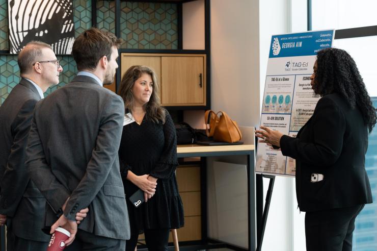 <p>Loretta Daniels (right), director of the TAG Bridge Builders program, explains her group's effort to have the technology sector in the state be more inclusive of Black tech talent as part of the Georgia AIM project. (PHOTO: Joya Chapman)</p>