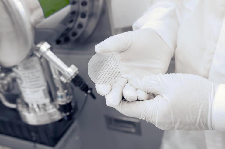 <p>Professor Alan Doolittle holds an example of advanced computing nanomaterials in his hands in the clean room inside Georgia Tech's Marcus Nanotechnology Building. Credit: Georgia Tech / Christopher Moore</p>