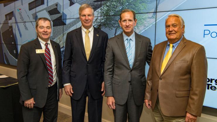 <p>From left, Georgia Public Service Commissioner Tim Echols, Georgia Tech President G.P. "Bud" Peterson, Chairman President and CEO for Georgia Power Paul Bowers, Georgia Public Service Commission Chairman Lauren “Bubba” McDonald gathered at the Georgia Power Georgia Experience Center for the signing of a memorandum of understanding that will launch a new microgrid to power buildings in Tech Square.</p>