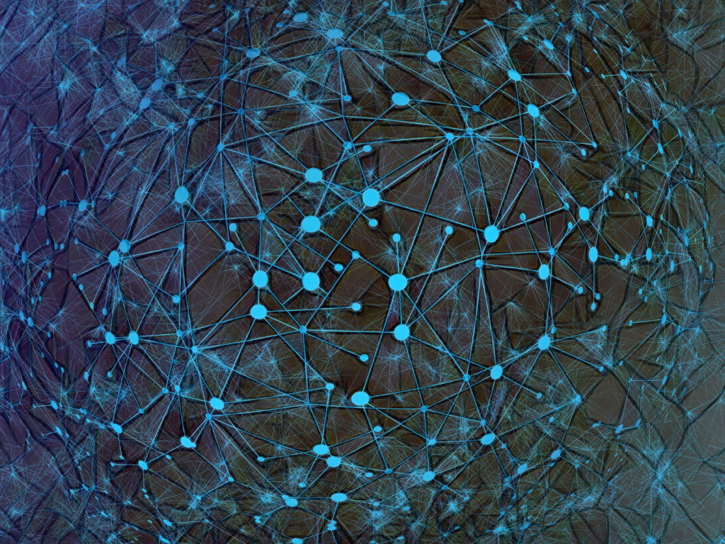 A blue image of interconnected nodes