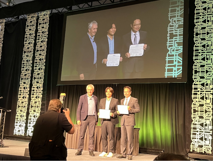 <p>Professor Sung Kyu Lim (right) and his former student Bon Woong Ku (middle) <a href="https://ece.gatech.edu/news/658676/lim-and-team-win-2022-transactions-computer-aided-design-best-paper-award">receiving the 2022 Donald O. Pederson Best Paper Award</a> for their paper “Compact-2D: A Physical Design Methodology to Build Two-Tier Gate-Level 3D ICs” published in IEEE TCAD.” </p>