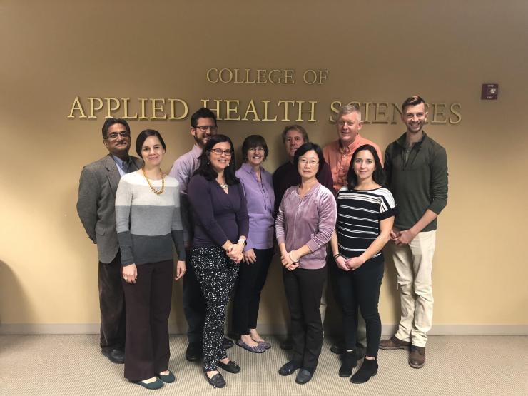 <p>TechSAge team members at the University of Illinois at Urbana-Champaign gather for a group picture in the College of Applied Health Sciences after the TechSAge 2 kick-off meeting. Investigators and staff pictured here: Front row (Left to right): Wendy Bartlo, Laura Rice, Sa Shen, Lyndsie Koon; Back row (Left to right): R.S. Sreenivas, Jacob Sosnoff, Wendy Rogers, Jeff Woods, Jon Gunderson, Brian Pastor</p>