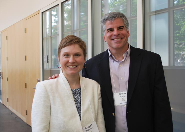 <p>Andrés García greets his former student, Abigail Wojtowicz, a keynote speaker at BioE Day.</p>