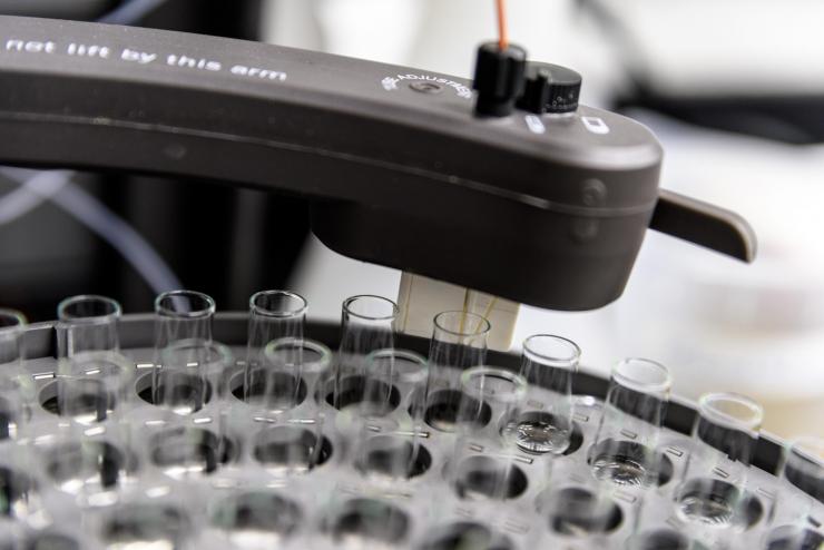 <p>A fraction collector in Raquel Lieberman's Georgia Tech lab dispenses liquid protein sample components, collecting a set volume before moving on to the next tube. Credit: Georgia Tech / Rob Felt</p>