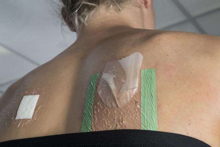 <p>A little bag collects sweat from the backs of subjects who participate in studies involving fluid loss and its possible consequences. This photo is not connected with a particular study. Credit: Georgia Tech / Christopher Moore</p>