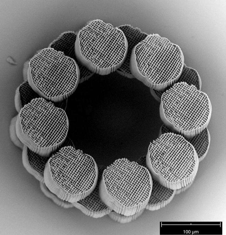 <p>A stacked 3D ring structure generated by overlapping several projections in 3D space. Arbitrarily complex 3D structures can be generated through this depth-resolved nanoscale 3D printing technique. (Credit: Vu Nguyen and Sourabh Saha)</p>