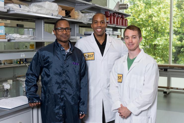 <p>Researchers have shown that silicon dioxide nanoparticles coated with a high dielectric constant polymer might inexpensively provide improved cooling for electronic devices. Shown (l-r) are Professor James Hammonds from Howard University, Associate Professor Baratunde Cola from Georgia Tech, and Georgia Tech Graduate Student Eric Tervo. (Credit: Rob Felt, Georgia Tech)</p>