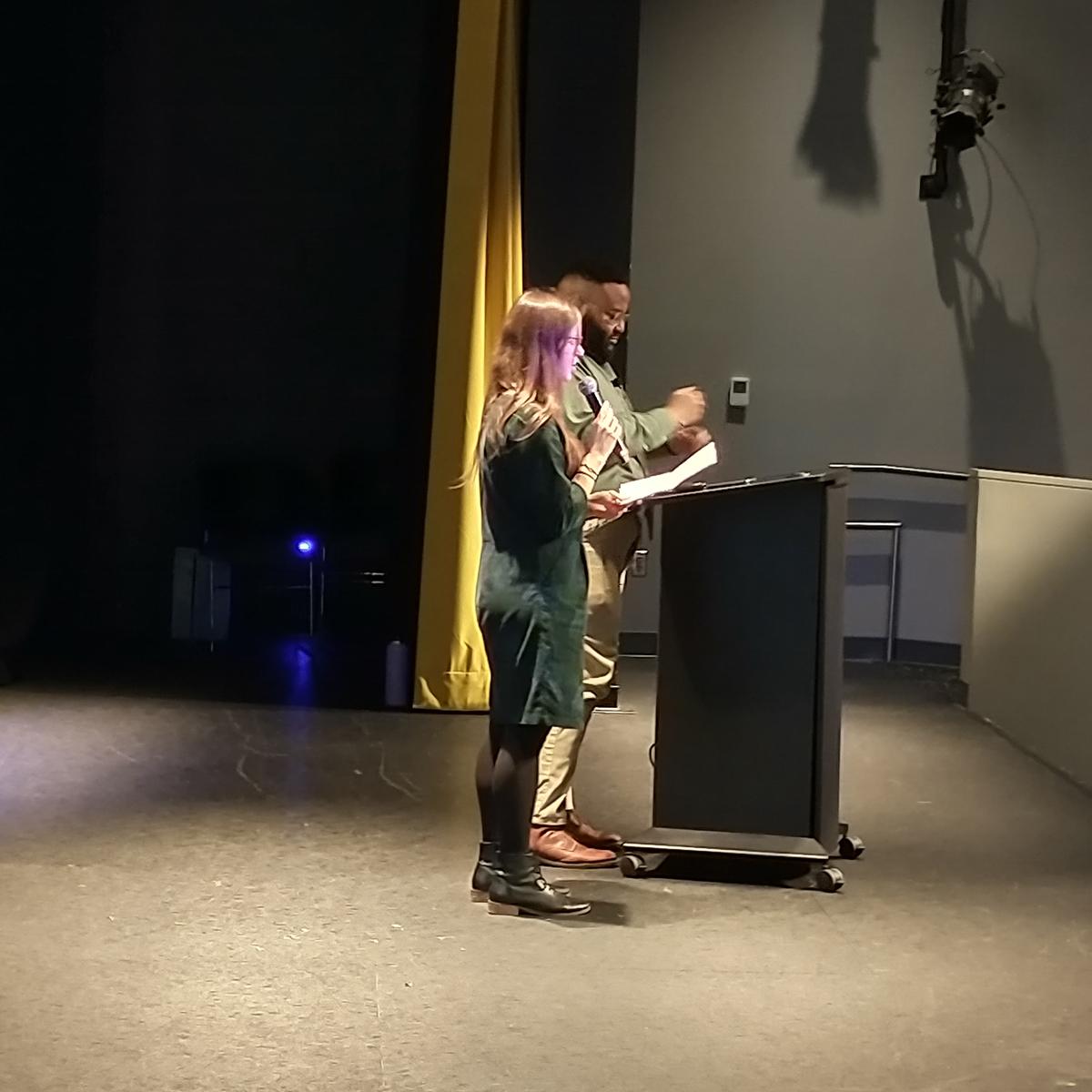 Nicole Kennard introduces Georgia Tech Alum Andrew White on the stage at the Atlantic Theater.