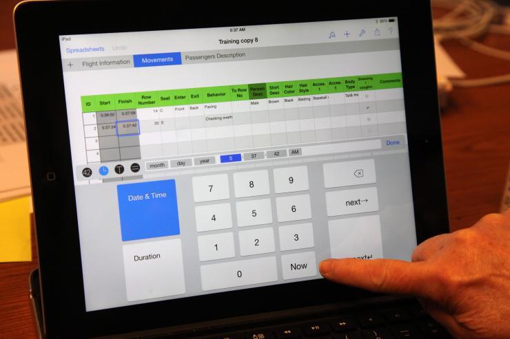 <p>Students stationed in different zones throughout an aircraft recorded the movement of passengers using this iPad application. (Credit: Emory University)</p>