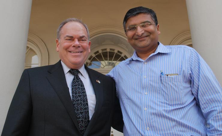 <p>Steve Cross, Georgia Tech's executive vice president for research, and Jaydev Desai, Petit Institute researcher and Coulter Department professor, meet at the inaugural International Symposium for Medical Robotics.</p>