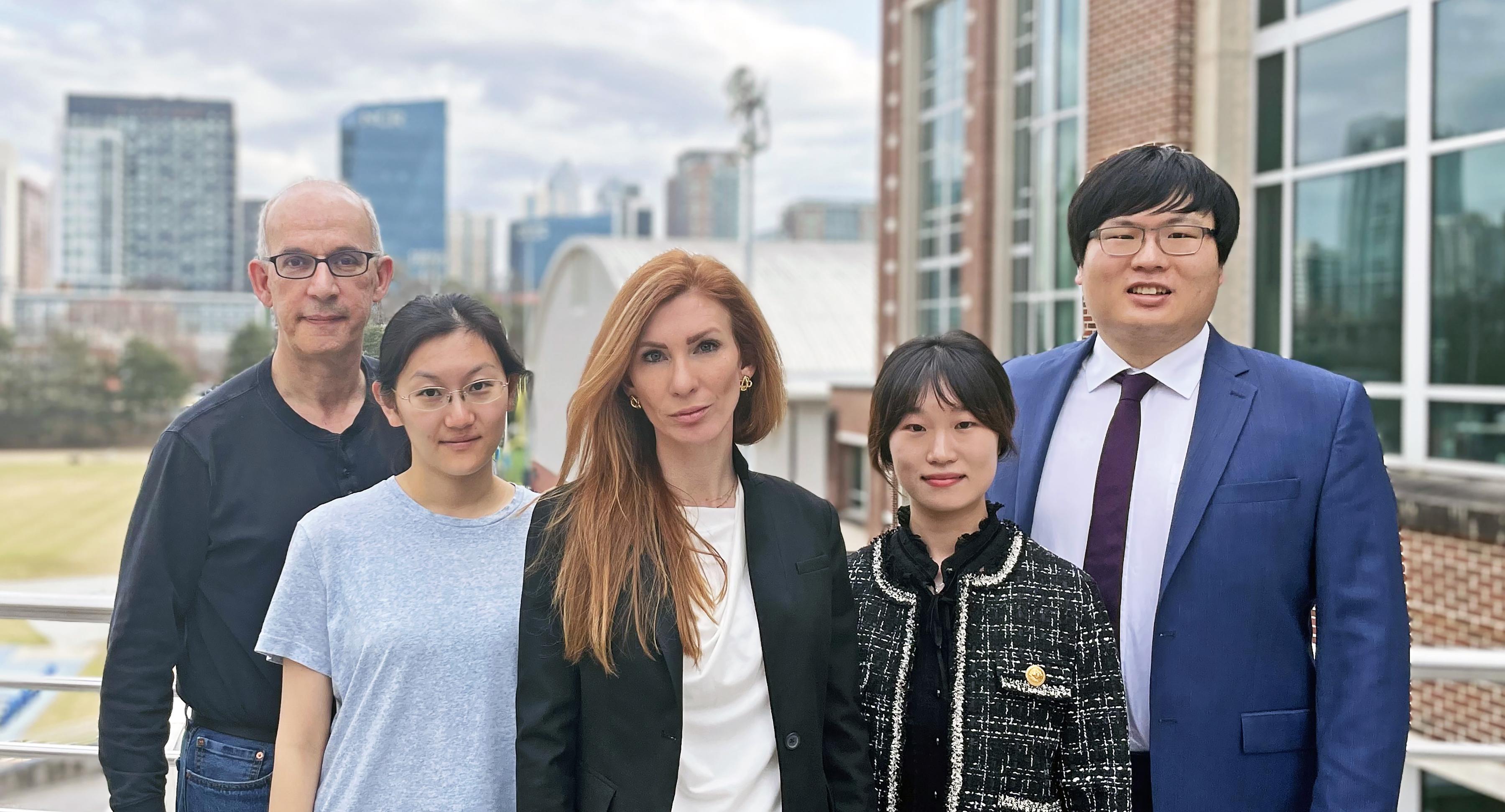 The OZ-Link leadership team is Professor M.G. Finn, Wenting Shi, Kasie Collins, Jasmine Hwang, and Steve Seo.