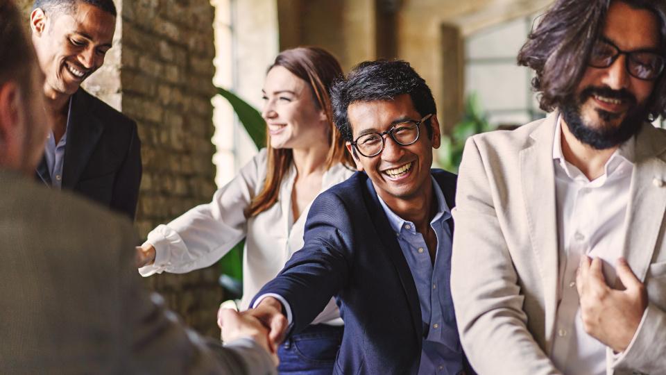 people shaking hands