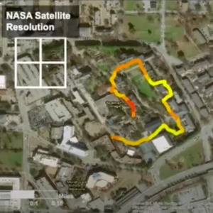 Satellite view of urban area with heat map overlay.